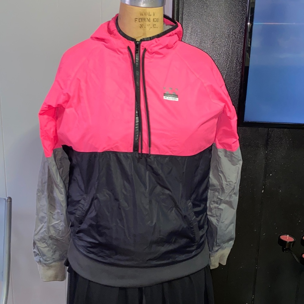 Pink and black windbreaker hoodie white writing